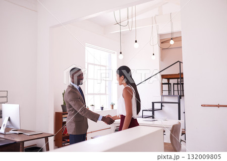 Happy black man, business people and handshake for teamwork, trust and thank you in office. Employees shaking hands for partnership, collaboration and support of b2b networking, welcome and agreement 132009805