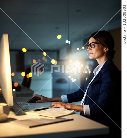 Businesswoman, desktop and focus at night or employee in the office or reading emails on bokeh. Corporate, dark and female manager or contemplate or research on pc in the evening and at workplace Businesswoman, desktop and focus at night or employee in the office or reading emails on bokeh. Corporate, dark and female manager or contemplate or research on pc in the evening and at workplace 132009903