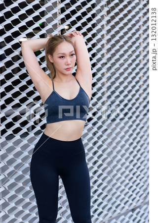 Sport woman outdoor workout exercise, fit people watch her stretching, maintaining healthy body for fitness goals. She completes dedicated workout session diligently, inspiring others. Sport woman outdoor workout exercise, fit people watch her stretching, maintaining healthy body for fitness goals. She completes dedicated workout session diligently, inspiring others. 132012138