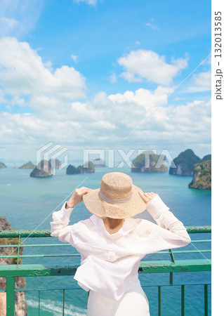 Woman tourist traveling in Krabi, Thailand. happy traveller enjoy and sightseeing view at koh Hong island viewpoint. summer trip, destination, Southeast Asia Travel, vacation and holiday concept 132013585