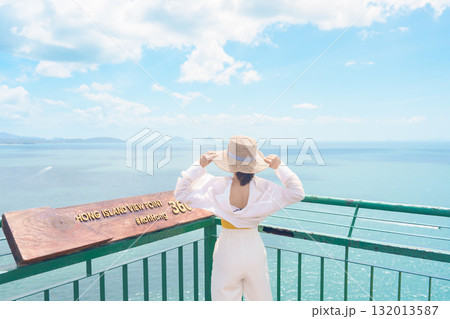 Woman tourist traveling in Krabi, Thailand. happy traveller enjoy and sightseeing view at koh Hong island viewpoint. summer trip, destination, Southeast Asia Travel, vacation and holiday concept 132013587