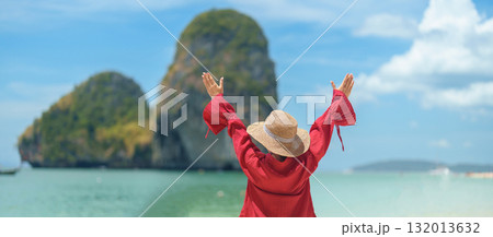 Woman tourist travel and sightseeing in Krabi, Thailand. happy traveller enjoy on beach at Phra nang Cave Beach near Railay Beach. summer trip, destination, Southeast Asia Travel and vacation concept Woman tourist travel and sightseeing in Krabi, Thailand. happy traveller enjoy on beach at Phra nang Cave Beach near Railay Beach. summer trip, destination, Southeast Asia Travel and vacation concept 132013632