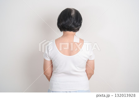 Elderly Woman having Shoulder Pain with Medicated pain relief patch plaster for Muscle Inflammation and Sprain, Myofascial ache syndrome and Fibromyalgia, Shoulder Myalgia and Scapular Tightness Elderly Woman having Shoulder Pain with Medicated pain relief patch plaster for Muscle Inflammation and Sprain, Myofascial ache syndrome and Fibromyalgia, Shoulder Myalgia and Scapular Tightness 132013928