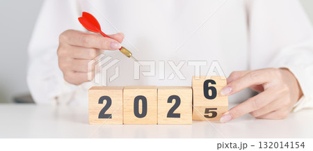 red dart with  chess people and 2026 year blocks.. Goal, plan, action, target, strategy, leadership, New Year and marketing concept 132014154