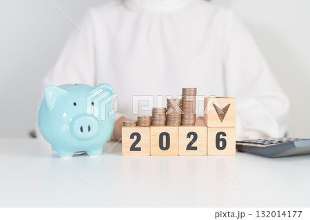 2026 New year with change to UP and Down arrow with coin stack. Interest rate, GDP, stocks market, financial, deflation and Inflation, mortgage, debt, Loan and Economic Recession 132014177