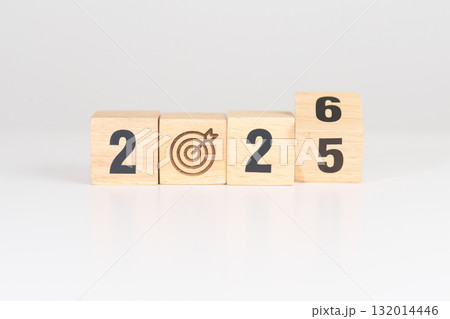 2025 year change to 2026 year block with dartboard icon. Goal, Target, Resolution, strategy, plan, Action, mission, motivation, and New Year start concepts 132014446