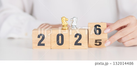 Happy New Year 2025 change to 2026 year block with horse chess. Year of the Horse, animals of the Chinese zodiac, horoscope, success and good fortune Happy New Year 2025 change to 2026 year block with horse chess. Year of the Horse, animals of the Chinese zodiac, horoscope, success and good fortune 132014486