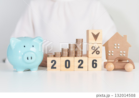 2026 New Year with percentage change to UP and Down arrow, car and Home model with coin stack. Car loan, Interest rate, real estate, house, Insurance, Financial, Repair, Tax, mortgage and Maintenance 132014508