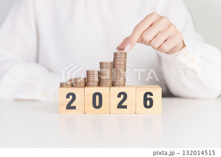 Happy New Year 2026 with Coins stack. Money, Budget, tax, investment, financial, savings and New Year Resolution concepts Happy New Year 2026 with Coins stack. Money, Budget, tax, investment, financial, savings and New Year Resolution concepts 132014515