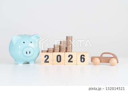 Happy New Year 2026 with car model and Coins Money stack for deposit and Automobile Tax. Money Saving, Car Insurance, Financial, vehicle Repair and Maintenance and New Year concept 132014521