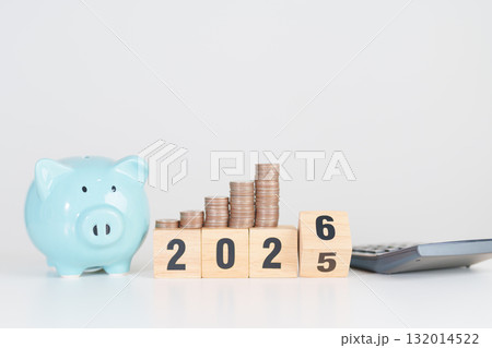 2025 end year to Happy New Year 2026 with piggy bank. Resolution, Goals, Plan, Action, Money Saving, Retirement fund, Pension, Investment and Financial concepts 132014522