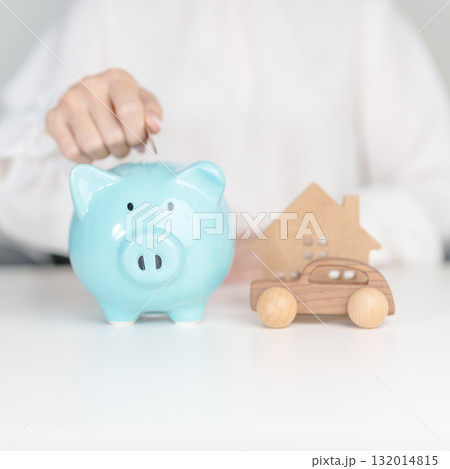 Piggy bank with car and Home model. Car loan, Interest rate, real estate, house, Insurance, Financial, Repair, Tax, mortgage and Maintenance 132014815