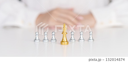 golden chess pawn pieces or leader businessman stand out of crowd people of silver men. leadership, business, team, teamwork and Human resource management concept golden chess pawn pieces or leader businessman stand out of crowd people of silver men. leadership, business, team, teamwork and Human resource management concept 132014874