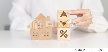 Percentage block change to UP and Down arrow with Home model. Real estate Mortgage, Refinance, House loan and debt, Interest rate, Insurance, Financial Property and economic recession Percentage block change to UP and Down arrow with Home model. Real estate Mortgage, Refinance, House loan and debt, Interest rate, Insurance, Financial Property and economic recession 132014880