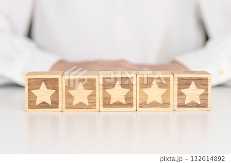 hand show Star block. Customer choose rating for user reviews. Service rating, ranking, customer review, satisfaction, evaluation and feedback concept hand show Star block. Customer choose rating for user reviews. Service rating, ranking, customer review, satisfaction, evaluation and feedback concept 132014892