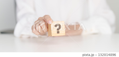 Wood block of Questions Mark sign. FAQ, frequency asked questions, Answer, Q and A, Information, Communication, problem and interrogation Concepts Wood block of Questions Mark sign. FAQ, frequency asked questions, Answer, Q and A, Information, Communication, problem and interrogation Concepts 132014896