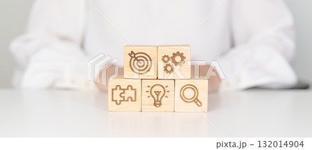 wood block with business goal, strategy, target, mission, action, objective, teamwork, research and idea concept wood block with business goal, strategy, target, mission, action, objective, teamwork, research and idea concept 132014904
