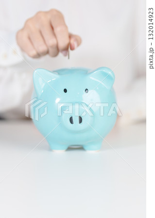 Money Saving for Future Plan, Retirement fund, Pension, Investment, Wealth Business and Financial concepts. hand holding and putting into piggy bank, Money Counting for World Savings day and Donate Money Saving for Future Plan, Retirement fund, Pension, Investment, Wealth Business and Financial concepts. hand holding and putting into piggy bank, Money Counting for World Savings day and Donate 132014923