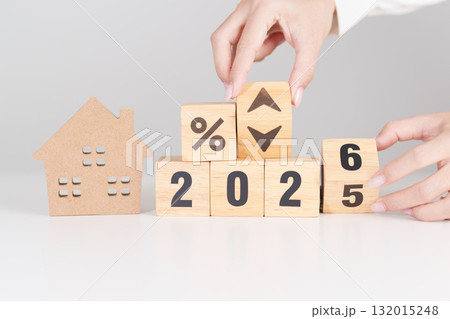 2026 New Year with percentage change to UP and Down arrow with Home model. Real estate Mortgage, Refinance, House loan and debt, Interest rate, Insurance, Financial and Property Tax 132015248
