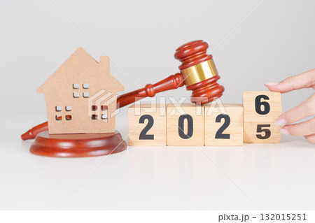 2025 end year to Happy New Year 2026 with small toy house model with gavel justice hammer on desk in courthouse. Real Estate Law, Home Insurance, property Tax, Auction and Bidding concepts 2025 end year to Happy New Year 2026 with small toy house model with gavel justice hammer on desk in courthouse. Real Estate Law, Home Insurance, property Tax, Auction and Bidding concepts 132015251