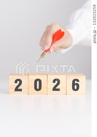 red dart with chess people and 2026 year blocks.. Goal, plan, action, target, strategy, leadership, New Year and marketing concept red dart with chess people and 2026 year blocks.. Goal, plan, action, target, strategy, leadership, New Year and marketing concept 132015259