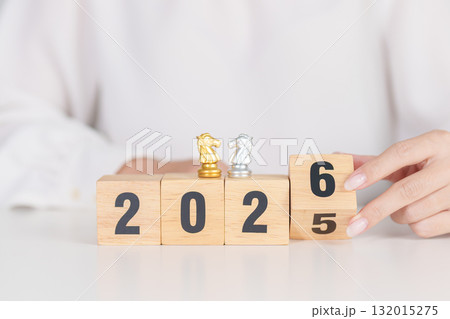 Happy New Year 2025 change to 2026 year block with horse chess. Year of the Horse, animals of the Chinese zodiac, horoscope, success and good fortune 132015275