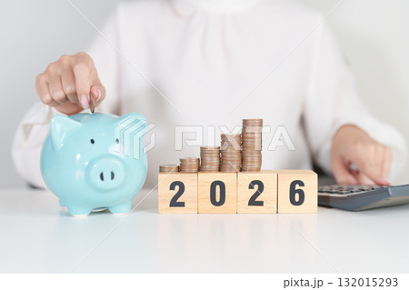 Happy New Year 2026 with piggy bank. Resolution, Goals, Plan, Action, Money Saving, Retirement fund, Pension, Investment and Financial concepts 132015293