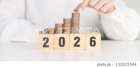 Happy New Year 2026 with Coins stack. Money, Budget, tax, investment, financial, savings and New Year Resolution concepts Happy New Year 2026 with Coins stack. Money, Budget, tax, investment, financial, savings and New Year Resolution concepts 132015304