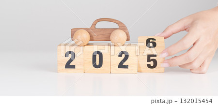 2025 end year to Happy New Year 2026 with Car model on table. Automobile Tax, Car Insurance, Financial, vehicle Repair and Maintenance and New Year concept 2025 end year to Happy New Year 2026 with Car model on table. Automobile Tax, Car Insurance, Financial, vehicle Repair and Maintenance and New Year concept 132015454