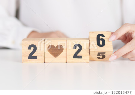 2025 end year to Happy New Year 2026 with heart block for health care, love, organ donation, resolution, charity, happy family, wellbeing and insurance concepts 132015477