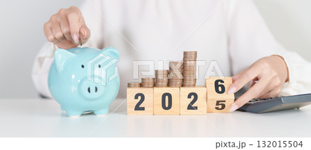 2025 end year to Happy New Year 2026 with piggy bank. Resolution, Goals, Plan, Action, Money Saving, Retirement fund, Pension, Investment and Financial concepts 2025 end year to Happy New Year 2026 with piggy bank. Resolution, Goals, Plan, Action, Money Saving, Retirement fund, Pension, Investment and Financial concepts 132015504