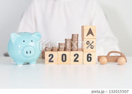 2026 New Year with percentage change to UP and Down arrow, car model and coin stack. Car loan, Interest rate, Insurance, Financial, vehicle Repair, Automobile Tax, mortgage and Maintenance 132015507