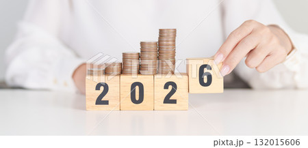 Happy New Year 2026 with Coins stack. Money, Budget, tax, investment, financial, savings and New Year Resolution concepts Happy New Year 2026 with Coins stack. Money, Budget, tax, investment, financial, savings and New Year Resolution concepts 132015606