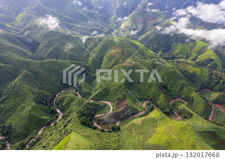 Landscape of Morning Mist with Mountain Layer. mountain ridge and clouds in rural jungle bush forest 132017668