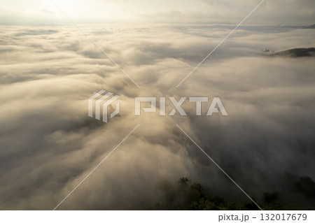 Landscape of Morning Mist with Mountain Layer. mountain ridge and clouds in rural jungle bush forest 132017679