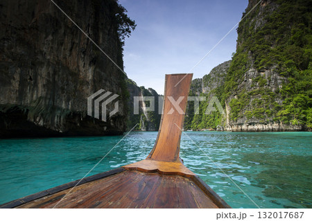 Long boat and blue water at Maya bay in Phi Phi Island, Krabi Thailand. 132017687