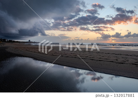 Nieuwpoort, West-Vlaanderen, Belgium, September 13th, 2025, A Serene Beach Sunset featuring an 132017881
