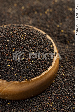 a large number of black rapeseed seeds are used to produce rapeseed oil, black rapeseed is used to produce food products, round bowl filled with round rapeseed seeds a large number of black rapeseed seeds are used to produce rapeseed oil, black rapeseed is used to produce food products, round bowl filled with round rapeseed seeds 132018477