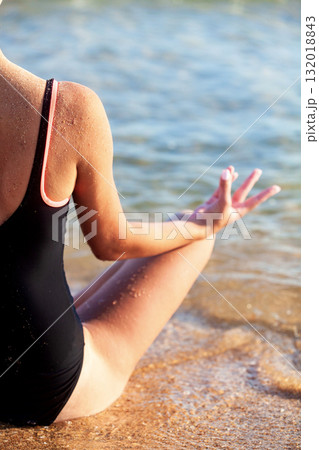 Woman yoga on a sea beach Woman yoga on a sea beach 132018843