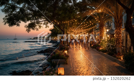 People enjoying an enchanting evening walk along a festive seaside promenade, string lights illuminating a vibrant coastal town and creating a romantic summer atmosphere at sunset 132020262