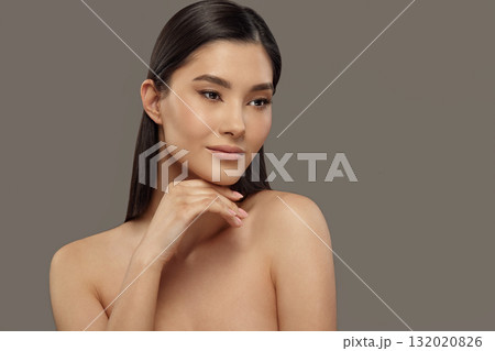 Well-groomed asian girl with healthy skin, smooth hair. Well-groomed asian girl with healthy skin, smooth hair. 132020826