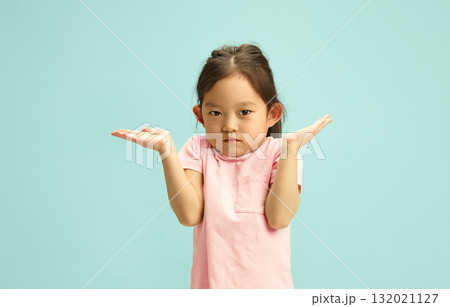 Confused Preschool Chinese Child Girl with Shrugged Shoulders saying I Don't Know, Questioningly and Puzzled, she Raised her Hands up, Showing Uncertainty or Lack of Knowledge, Studio Portrait Confused Preschool Chinese Child Girl with Shrugged Shoulders saying I Don't Know, Questioningly and Puzzled, she Raised her Hands up, Showing Uncertainty or Lack of Knowledge, Studio Portrait 132021127