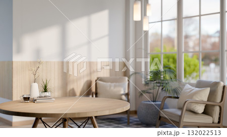 The set of round wooden table with armchairs in the middle of a lounge or restaurant. The set of round wooden table with armchairs in the middle of a lounge or restaurant. 132022513