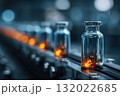 A production line showcases vials of medicine, highlighting the careful precision in pharmaceutical manufacturing and quality control, ensuring each medicine is safe and effective 132022685