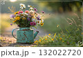 Rustic Flower Vase in Sunlit Garden.Turquoise watering can with wildflowers on grass, glowing in warm sunlight. Perfect for spring, nature, and romantic themes. Rustic Flower Vase in Sunlit Garden.Turquoise watering can with wildflowers on grass, glowing in warm sunlight. Perfect for spring, nature, and romantic themes. 132022720