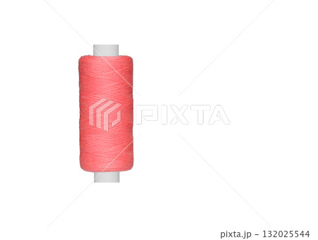 pink spool of sewing thread isolated on white background 132025544