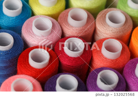 Set of colorful spools of thread 132025568