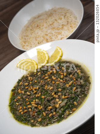 Spinach or Sabanekh with chicken a Mediterranean dish served with rice 132026854