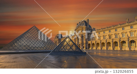 Paris, France - October 04 2025: Stunning sunset view of the Louvre with glass pyramid 132026855