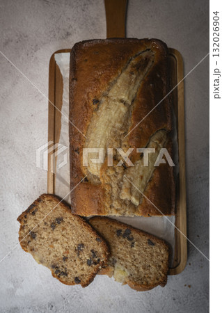 Delicious homemade banana bread sliced and ready to enjoy Delicious homemade banana bread sliced and ready to enjoy 132026904